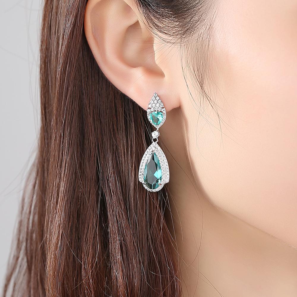 Luxury Rhodium Plated Earrings Encrusted With The Shiny Green Zircon Stone For Women 