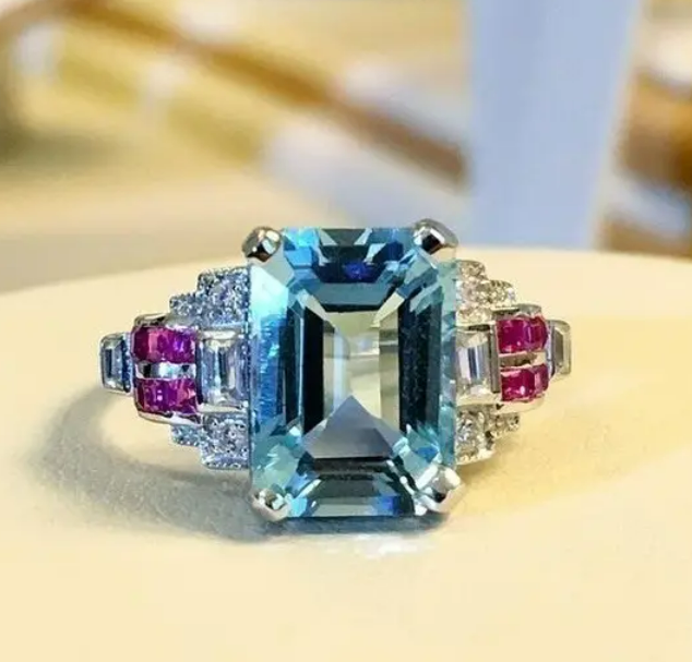 Fashion Silver Plated Ring Encrusted With Shiny Light Blue Zircon Stones For Women And Girls